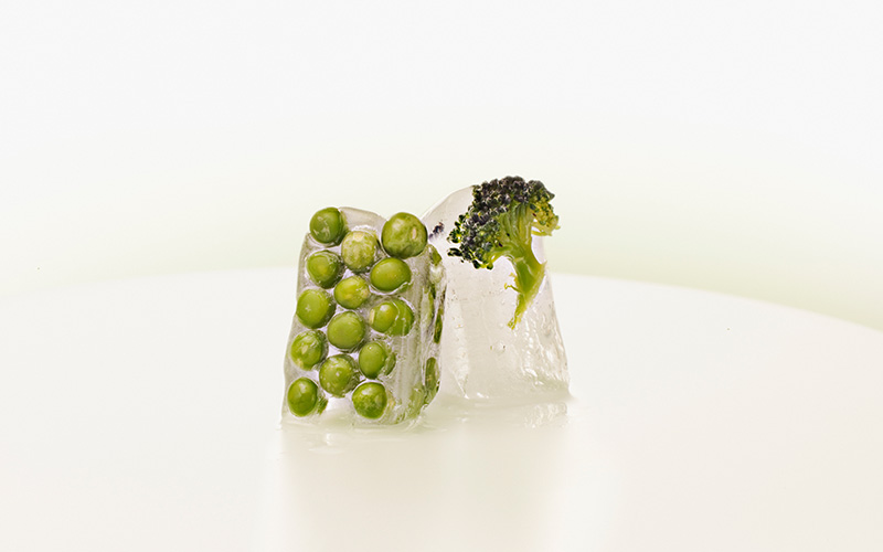Are frozen foods healthy? If prepared like these ice-block-encased peas and broccoli floret, you can't be sure.