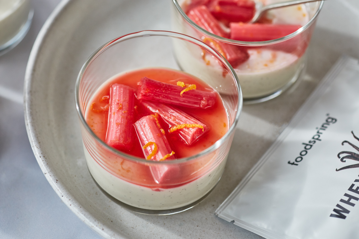 Protein Panna Cotta with poached rhubarb and orange in a glass