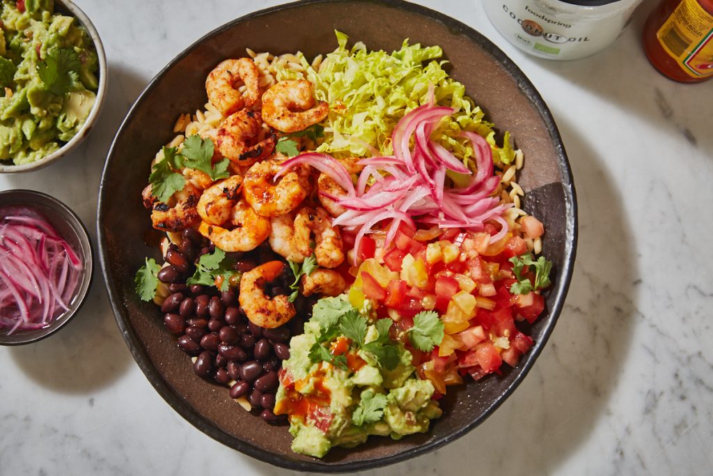 grilled prawn burrito bowl with hot sauce