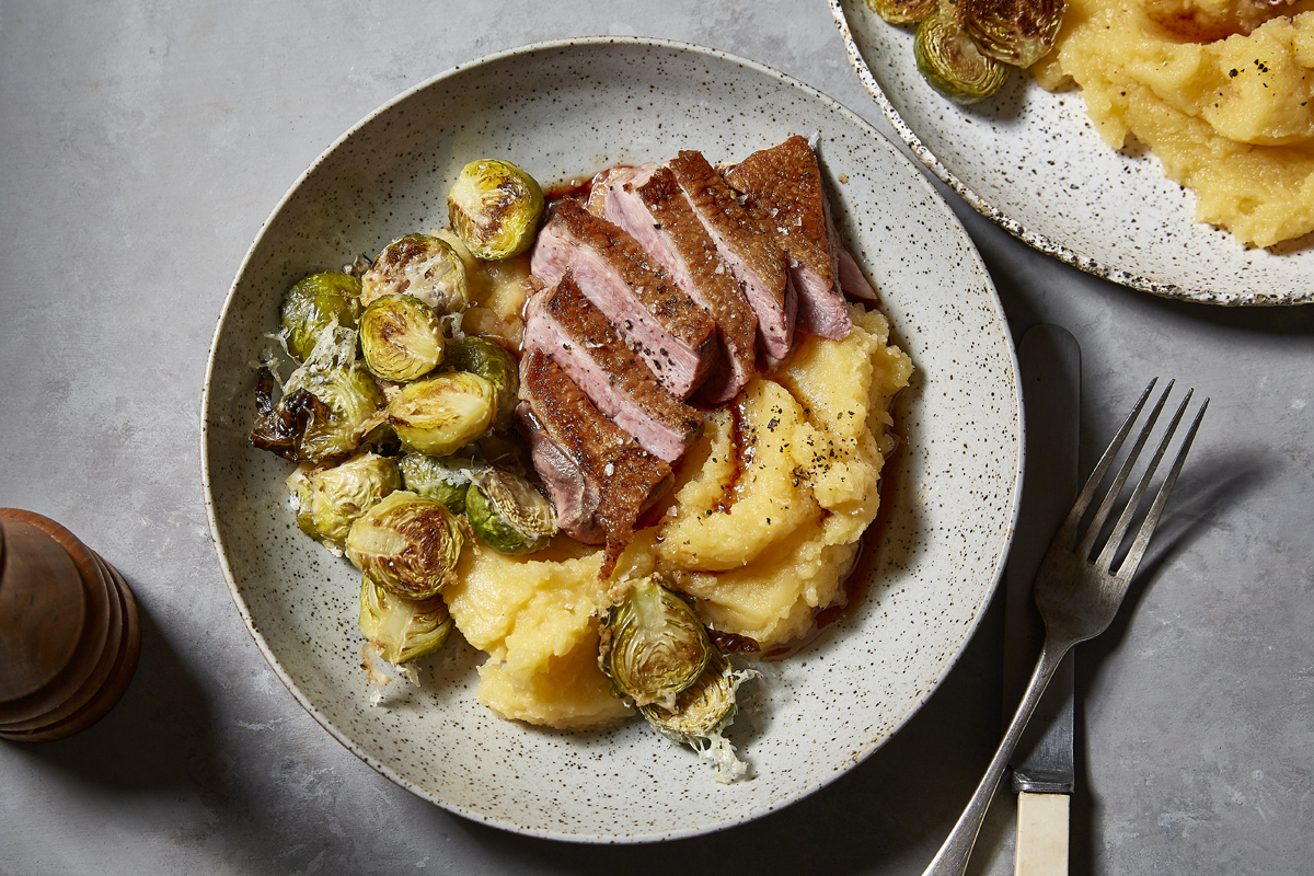 crispy duck breast with mash and brussels sprouts